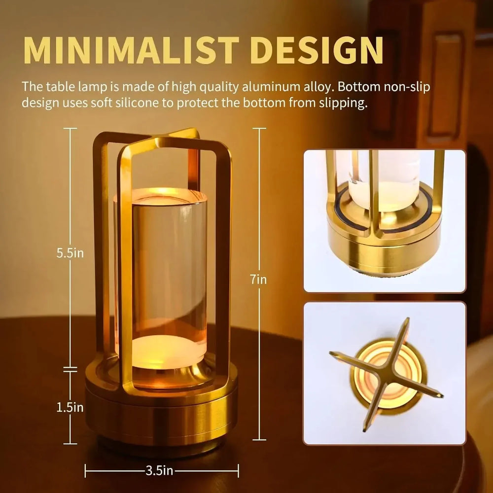 Gold table lamp with dimensions and features highlighted on a wooden surface.