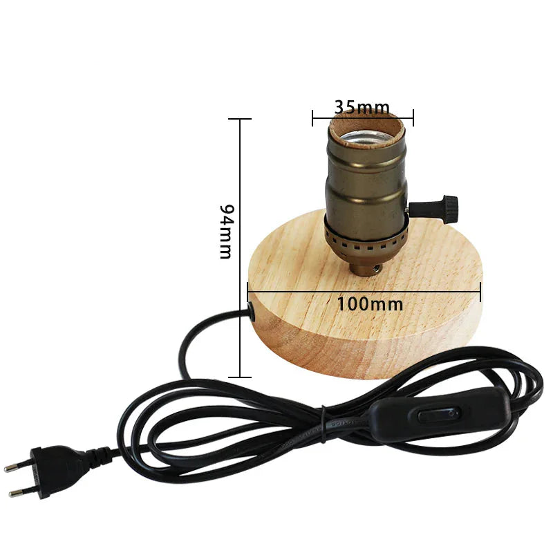 Wooden lamp base with dimensions and a black cord 